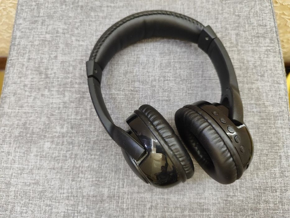 Продам беспроводные наушники S99