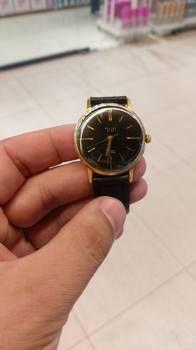 Позолоченные часы полет