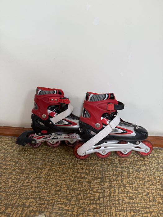 Роликовые коньки