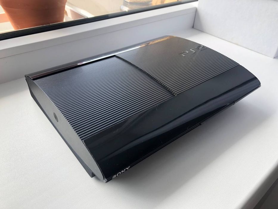 Прошитая PlayStation 3 + 65 игр