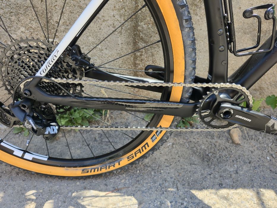 Карбонов XC велосипед цола Wilier 1x12 NX Като нов Проходни оси Rockshox Recon