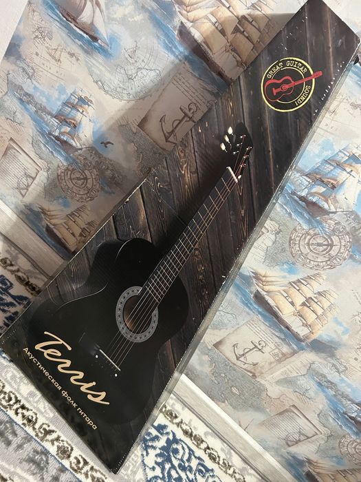 Акустическая гитара