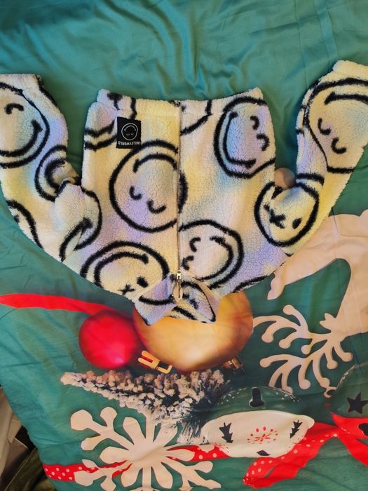 Jacheta pufoasa cu imprimeu