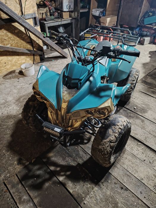 ATV de 125 cu 3 trepte și mansalier