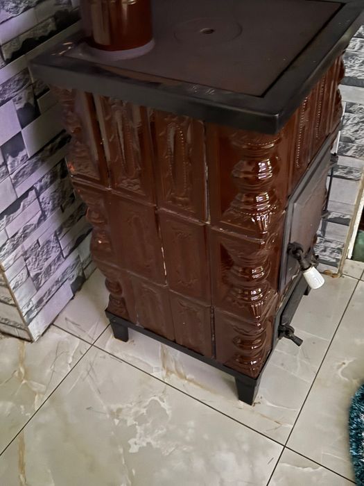 Soba teracotă în stare perfectă de funcționare