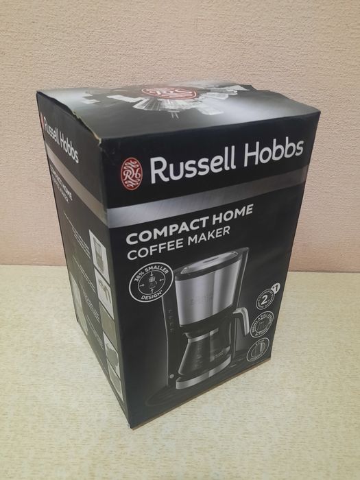 Электрическая кофеварка .