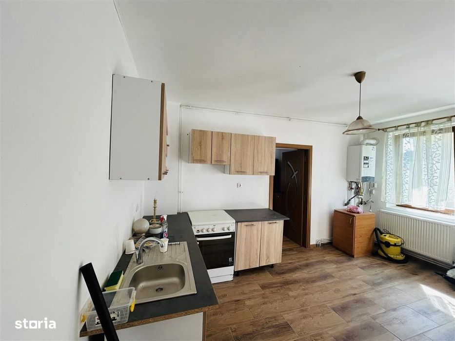 Casa individuala cu 2 corpuri de cladire si teren 625 mp