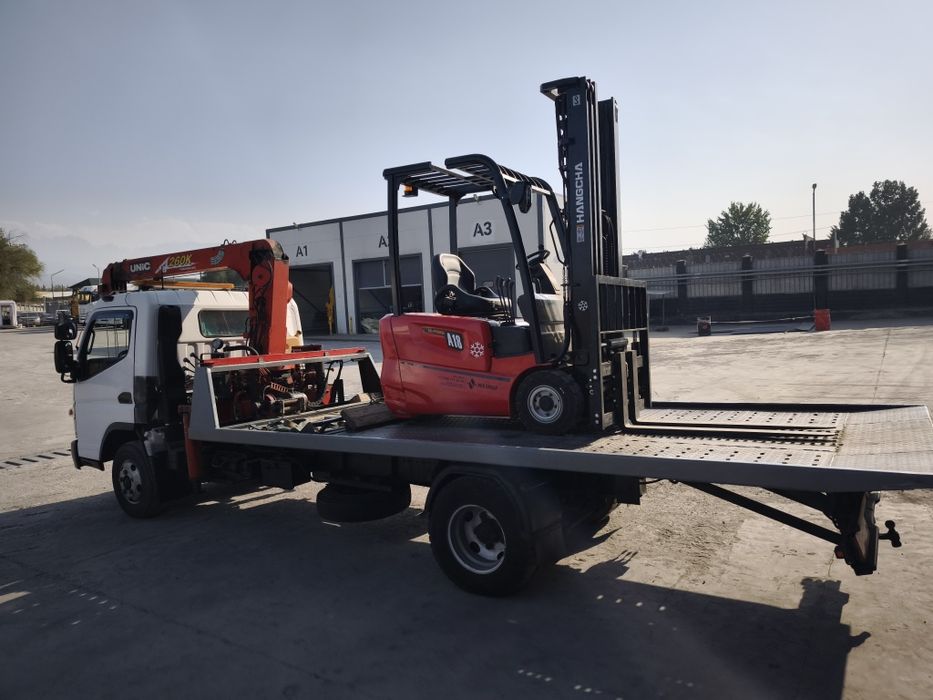 Грузовой эвакуатор манипулятор