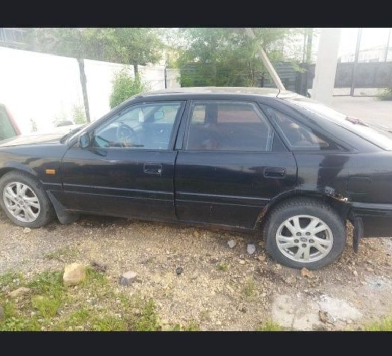 Продам запчасти на Мазда 626