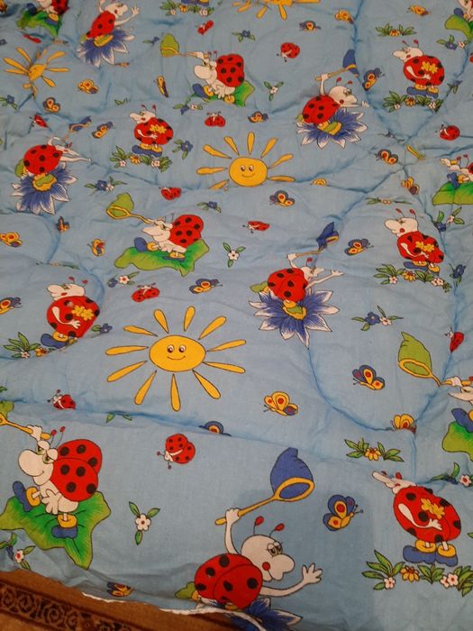 Одеяло в детскую кроватку