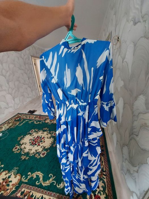 Әдемі качестводағы көк көйлек сатылады