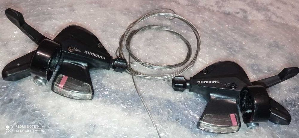 Велозапчасти (манетки, манетка Shimano).