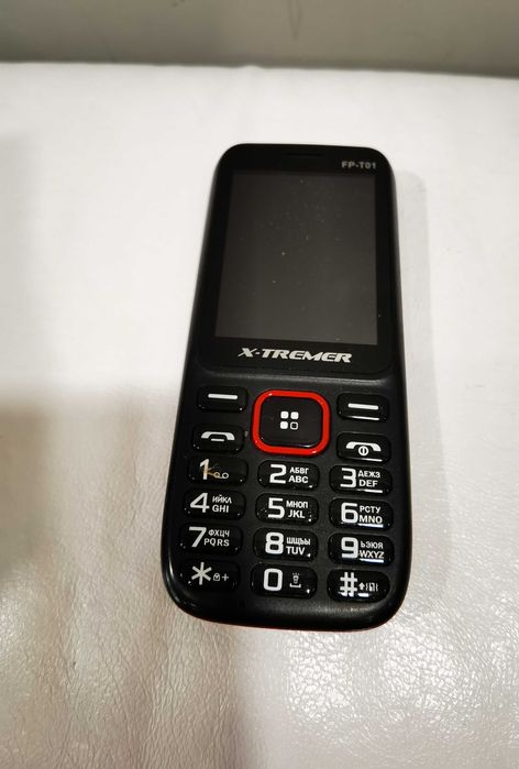 Мобилен телефон X - tremer