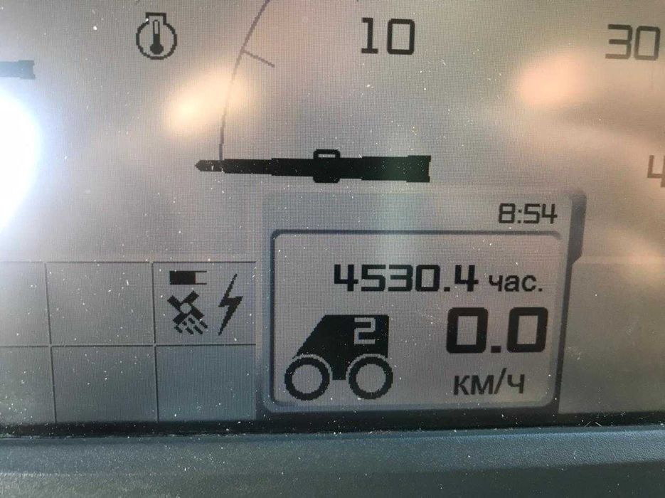 комбайн Claas Lexion 670 .