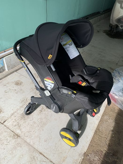 Продается коляска-автокресло Doona Grey Hound