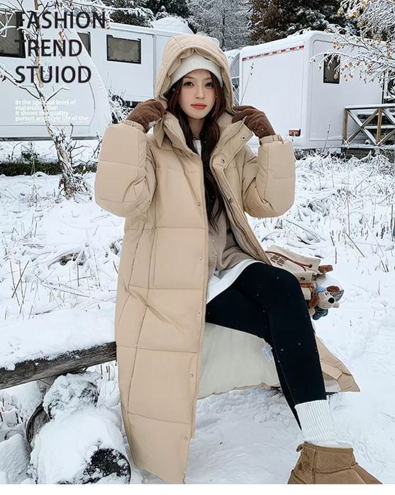 Продам пуховик длинный