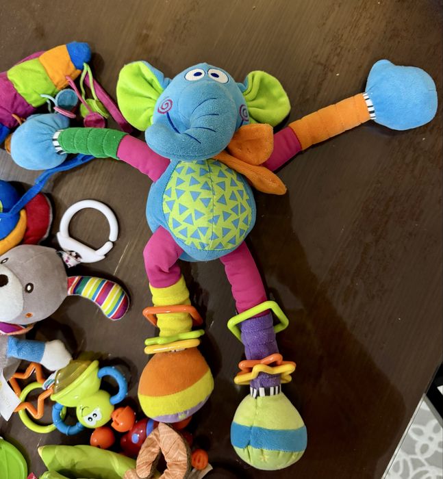 Подвесные игрушки в коляску манеж