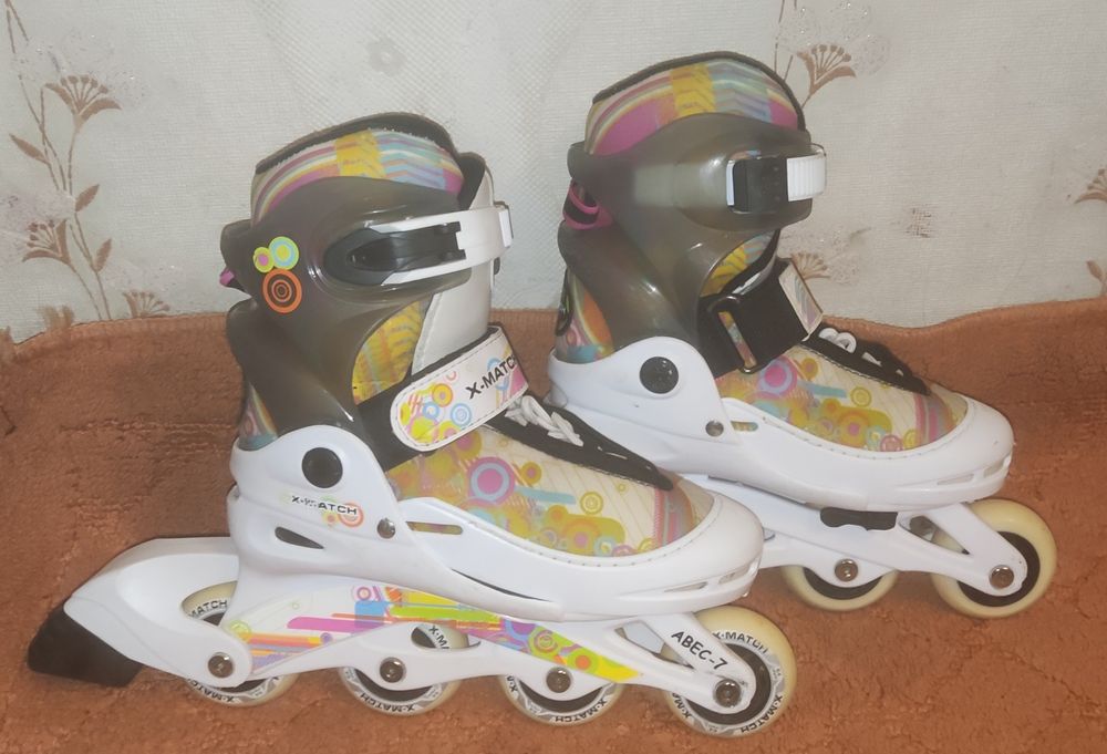 Роликовые коньки