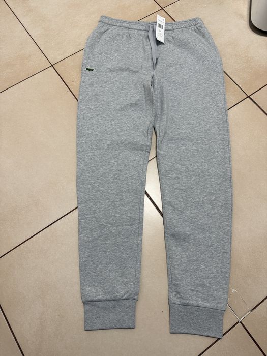 Vand pantaloni lacoste originali marimea L