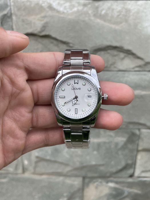 Металлические часы