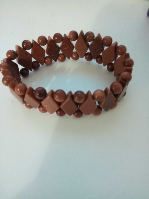 Браслеты с талисманами Дзи