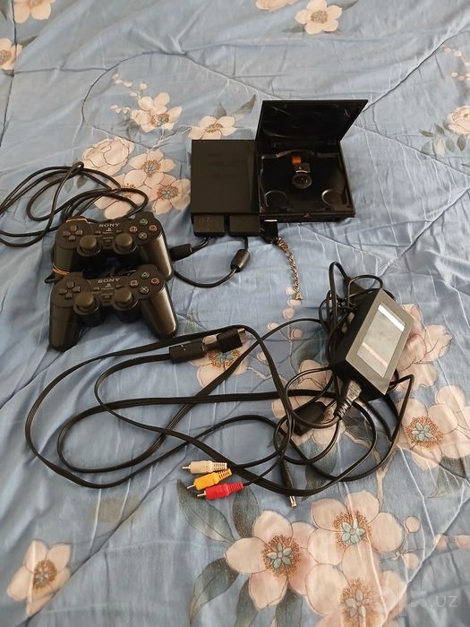 Playstation 2 original joystigi bilan