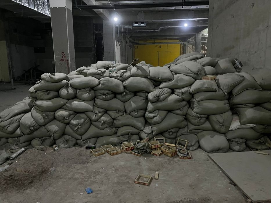 Песок в мешках,капталған құм