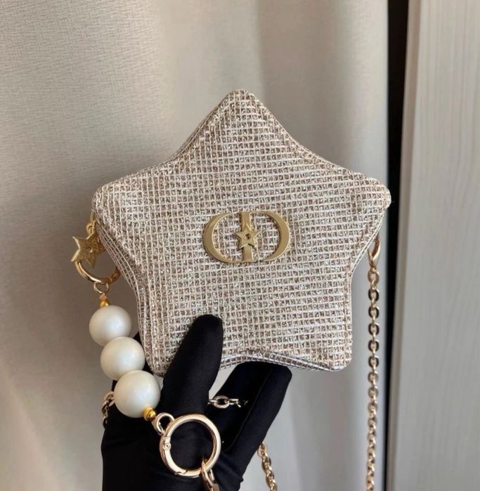 Две златни чанти Dior