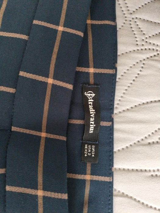 Брюки в клетку Фирма Stradivarius