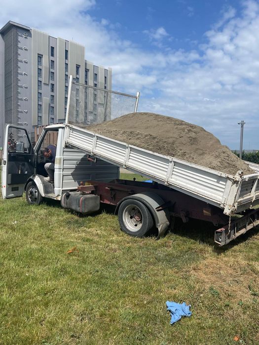 Transport nisip, balastru, piatra concasată .