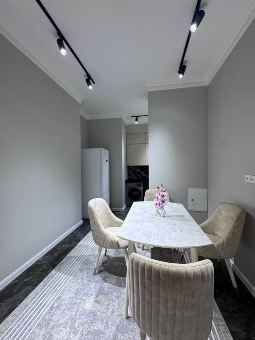 Паркентский  Real House 4/7/9.  Кирпич 100м²