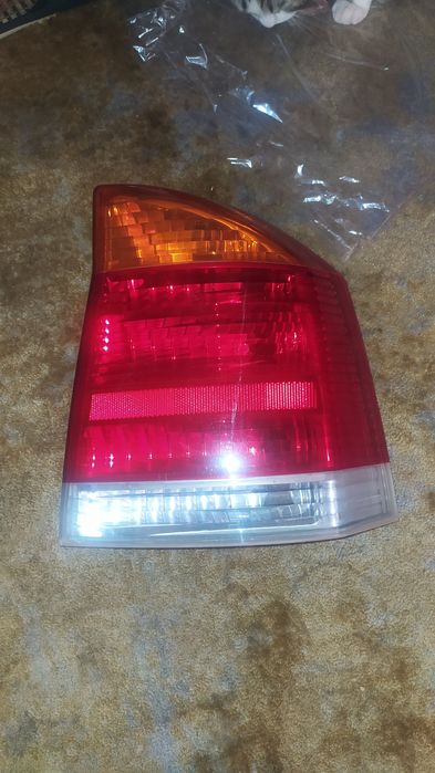 Продам фонарь задний.