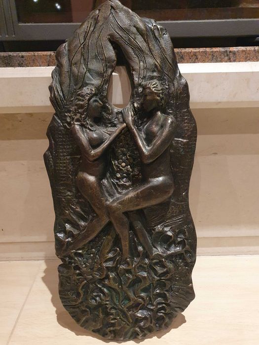 Скулптура за стена