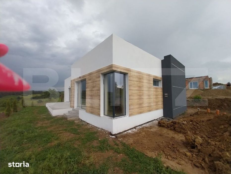 Casa noua mediteraneana, 3 camere, 105 mp utili, teren 630 mp, drum pr
