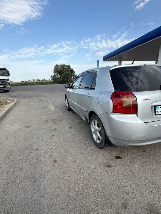 Тойота каролла 2003