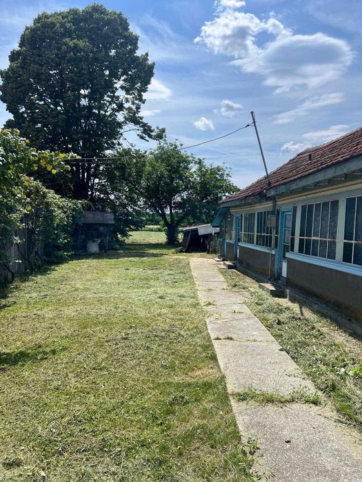 Teren intravilan 2.395 mp Ciolpani | 100 m DN1 | Utilități | Casă existentă