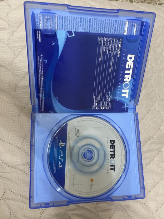 диск God of War и Detroit