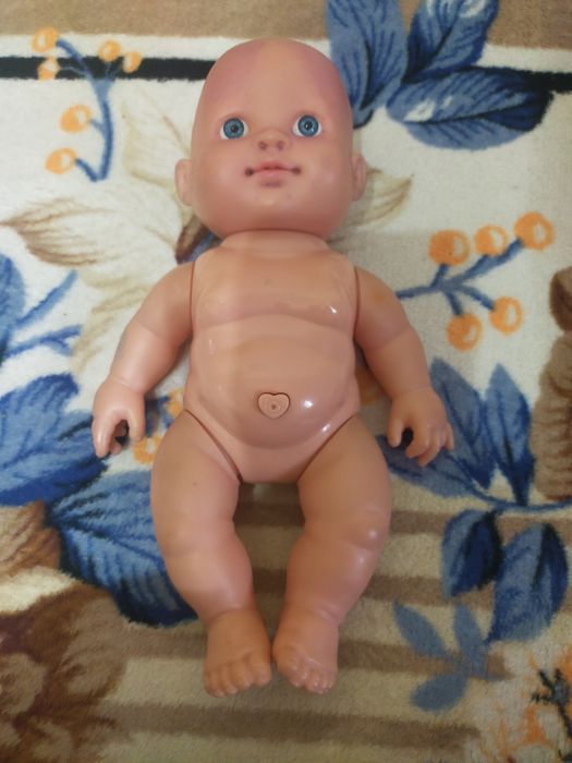 Кукла музыкальная.