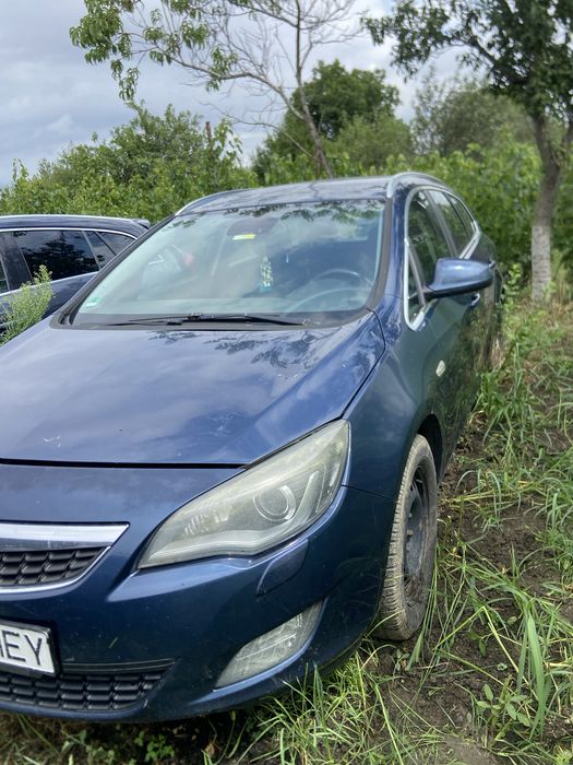 Pachet frontal/fata/bot bara/aripi/capota opel astra j faruri bixenon