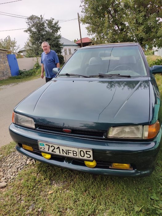 Мазда 323 фамилия