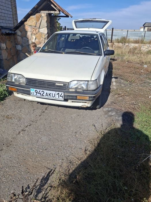 Продам машину мазда 323