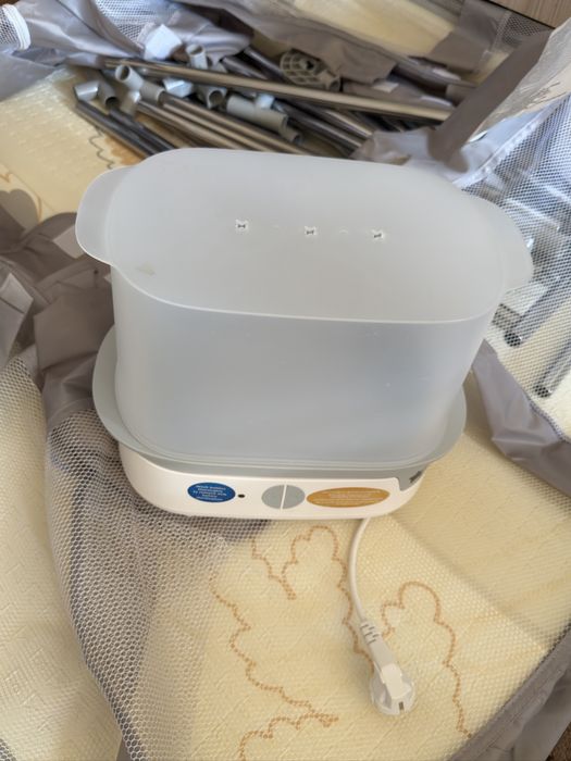 стерилизатор tommee tippee и кошара  за  игри 120-120
