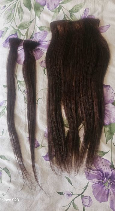 Натуральные волосы прошиты в тресс.