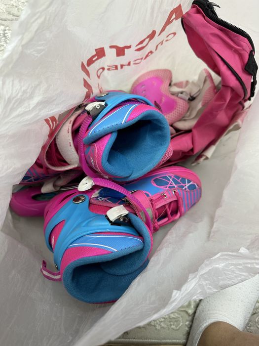 Продам ролики для девочки розового цвета