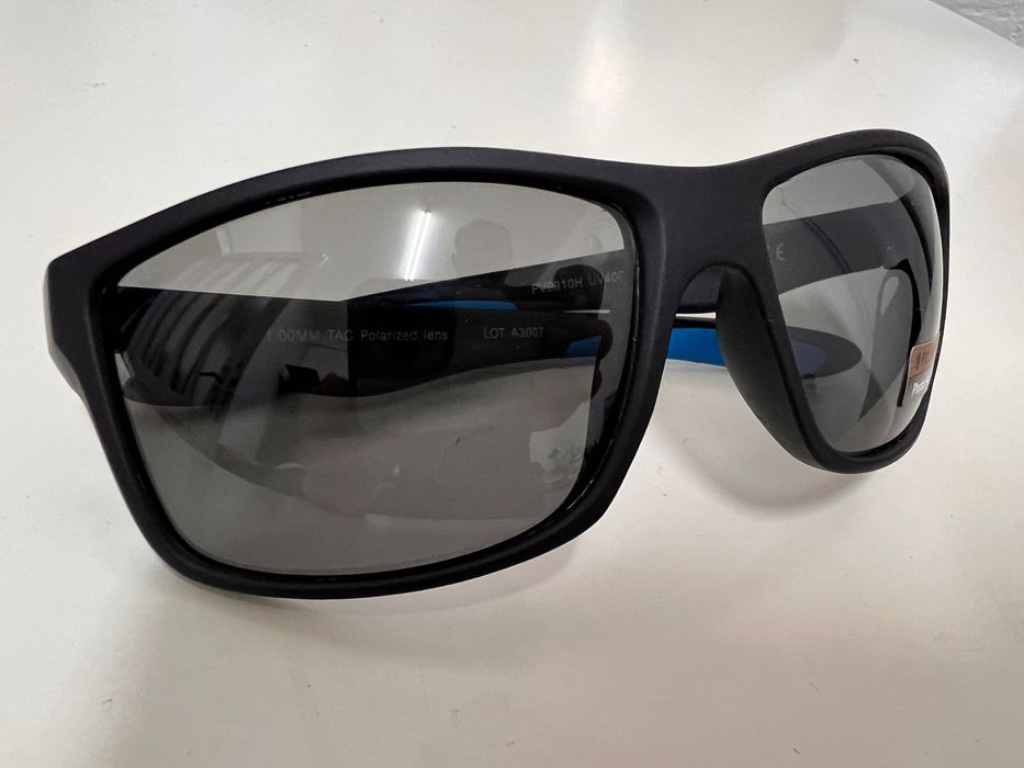 Ochelari de soare cu lentile polarizate și fotosensibile