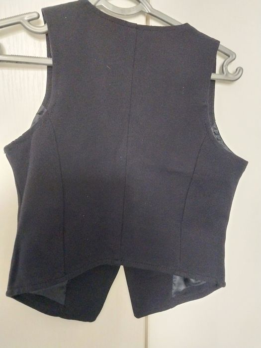 Жилетка  школьная .