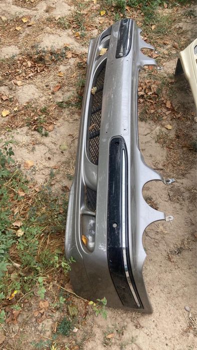 Мерседес 210 лупарик оригинал передний бампер