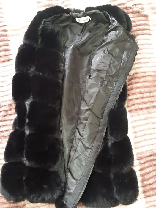 Продам жилетку меховую