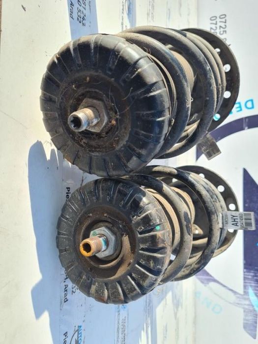 Amortizor cu arc stanga dreapta fata Chevrolet Aveo T300 1.2 benzina;