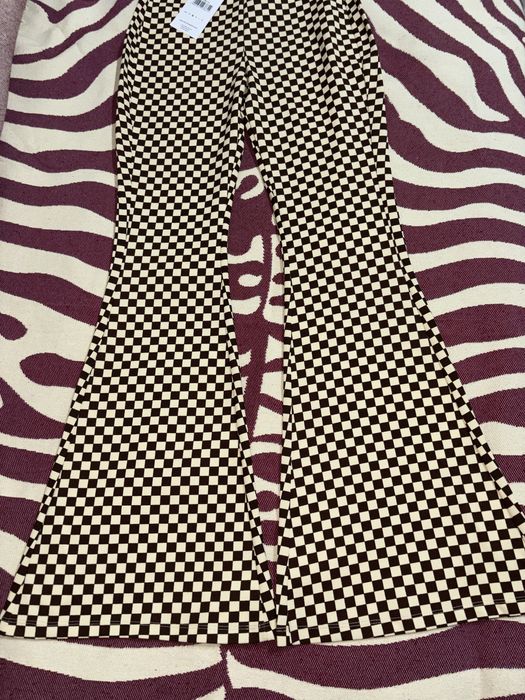 Клетчатые штаны клёш